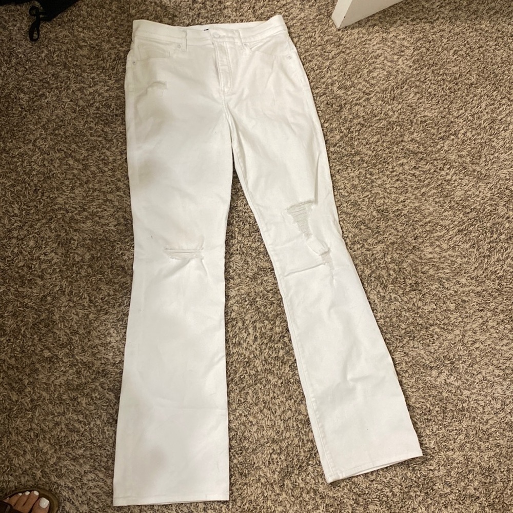 White flare express jeans. Never worn